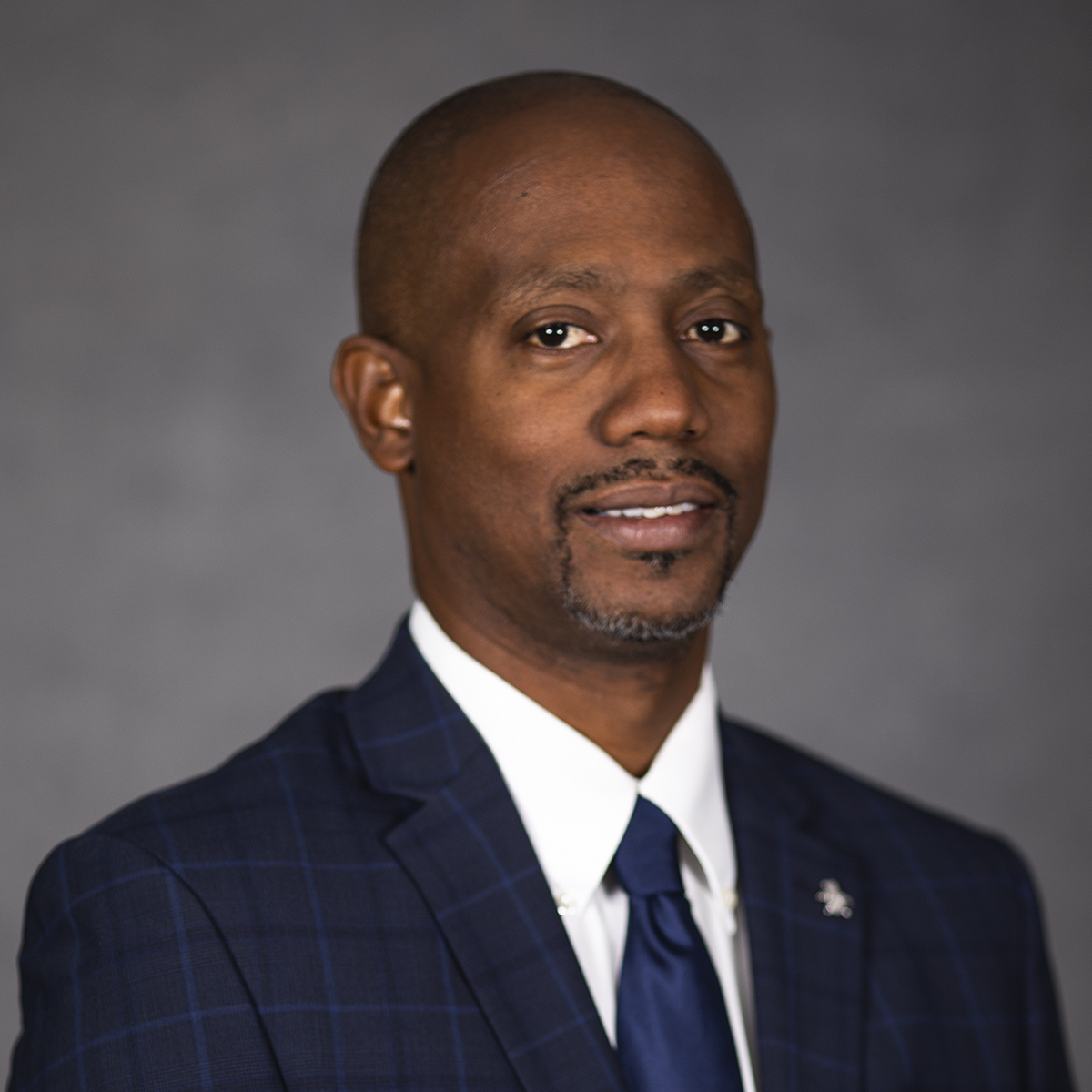 Commissioner Lumon J May